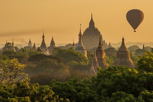 Bagan Balloons at sunrise, Myanmar. This is one of my favorite photos, the complexity of the temples with that one single balloon, it's almost unreal.